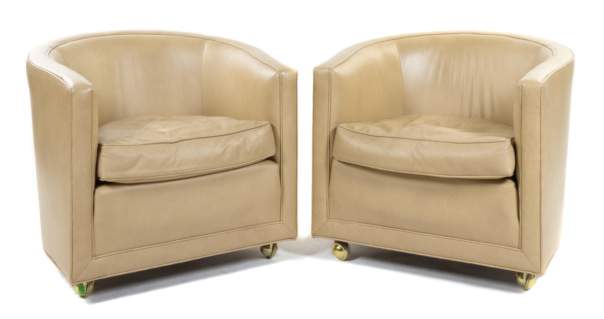 A Pair of Dunbar Barrel-Back Chairs Height 27 inches.