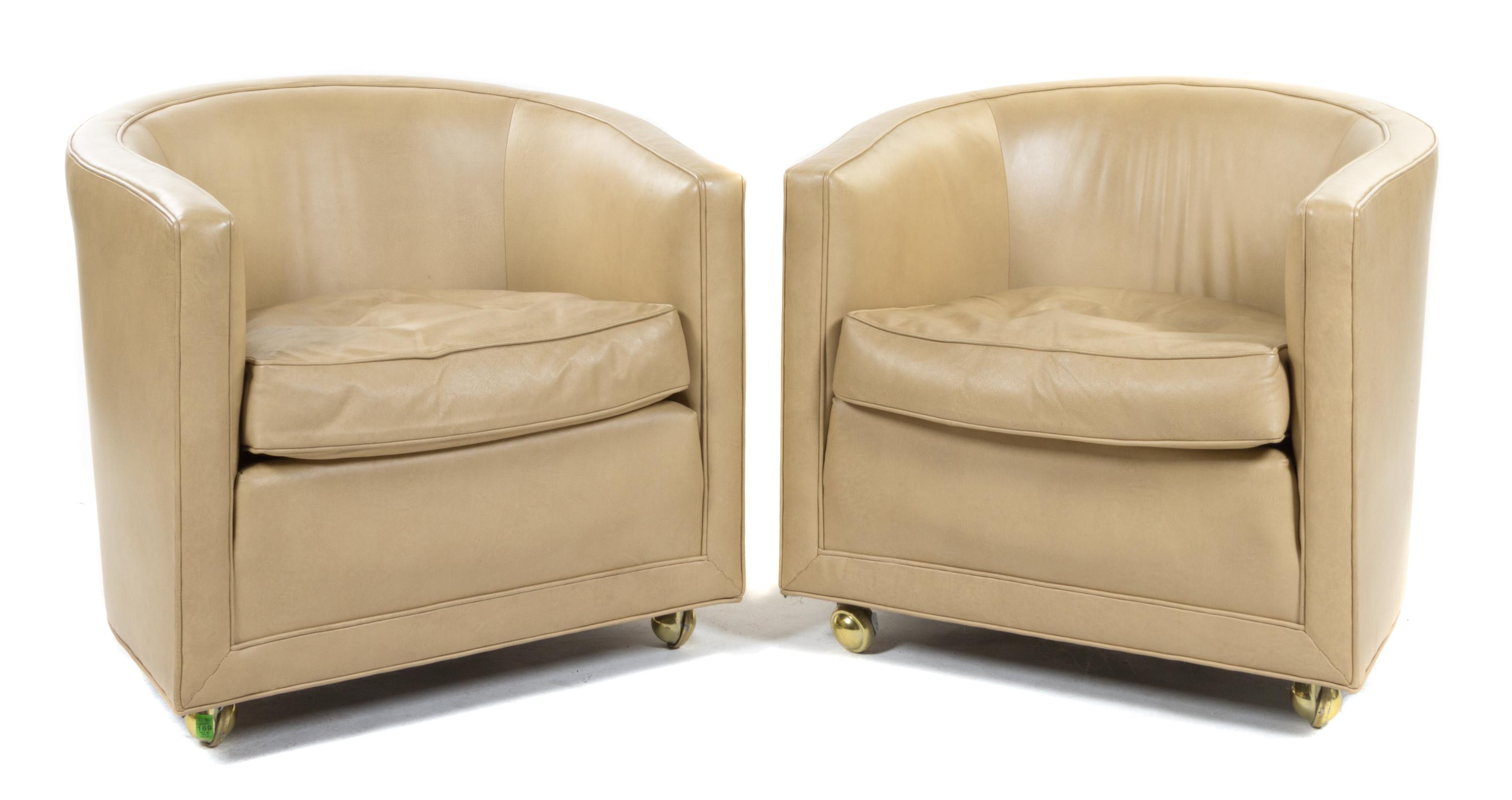 A Pair of Dunbar Barrel-Back Chairs Height 27 inches.