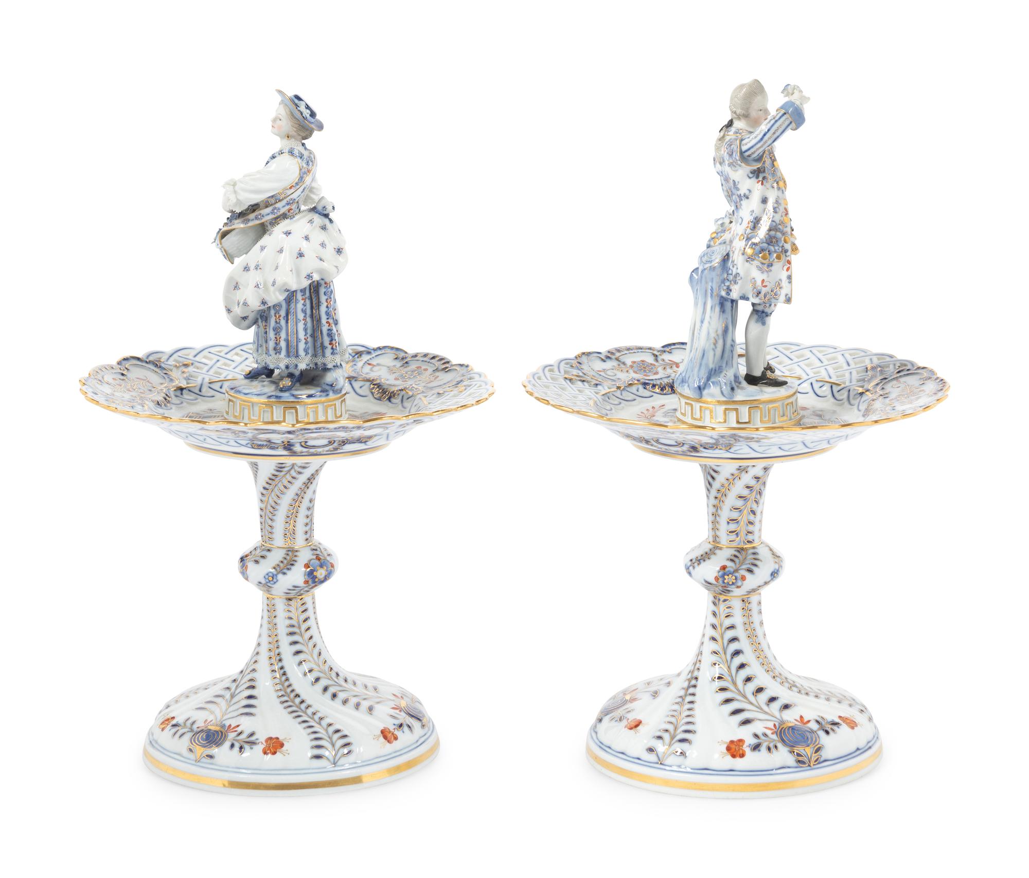 A Pair of Meissen Porcelain Figural Sweetmeat Dishes