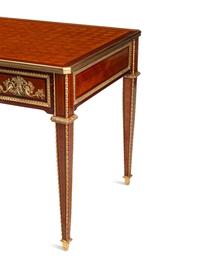 A Louis XVI Style Gilt Bronze Mounted Parquetry Bureau Plat