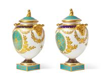 A Pair of Wedgwood Neoclassical Parcel-Gilt Urns