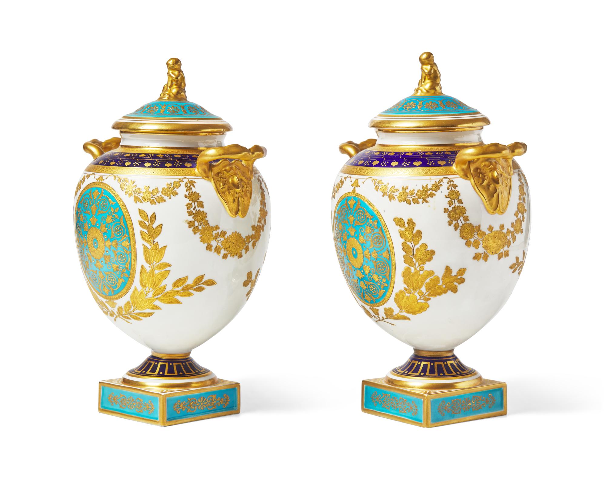 A Pair of Wedgwood Neoclassical Parcel-Gilt Urns