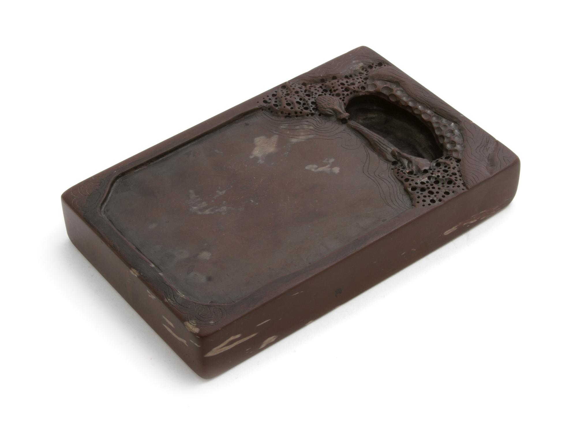 A Chinese Carved Hardstone Ink Stone, Width 6 5/8 inches.