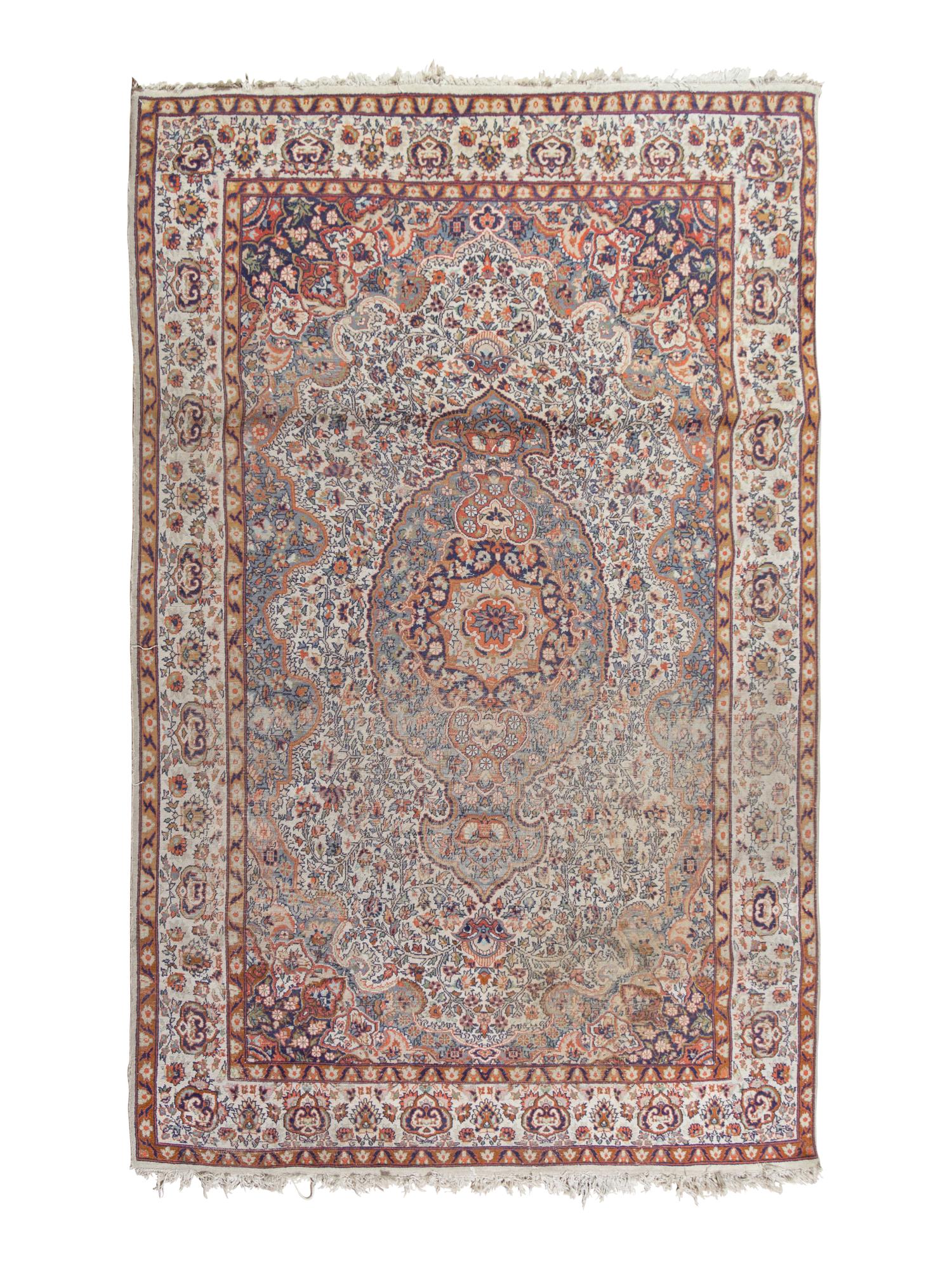 A Tabriz Wool Rug