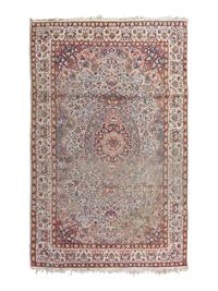 A Tabriz Wool Rug