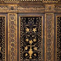 An Italian Iron-Mounted and Parcel Gilt Bookcase Supplied by Addison Mizner for the Everglades Club, Palm Beach