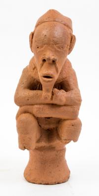 A Nok Style Pottery Figure Height 13 3/4 inches.