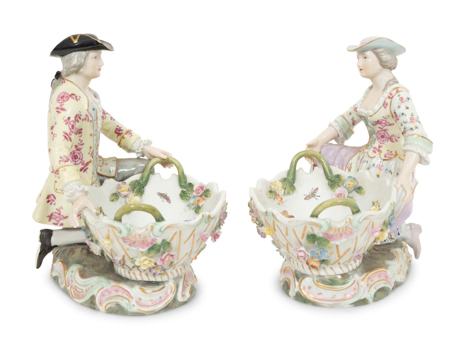 A Pair of Dresden Porcelain Figural Sweetmeat Dishes