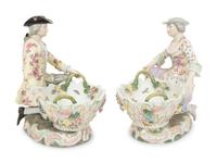 A Pair of Dresden Porcelain Figural Sweetmeat Dishes