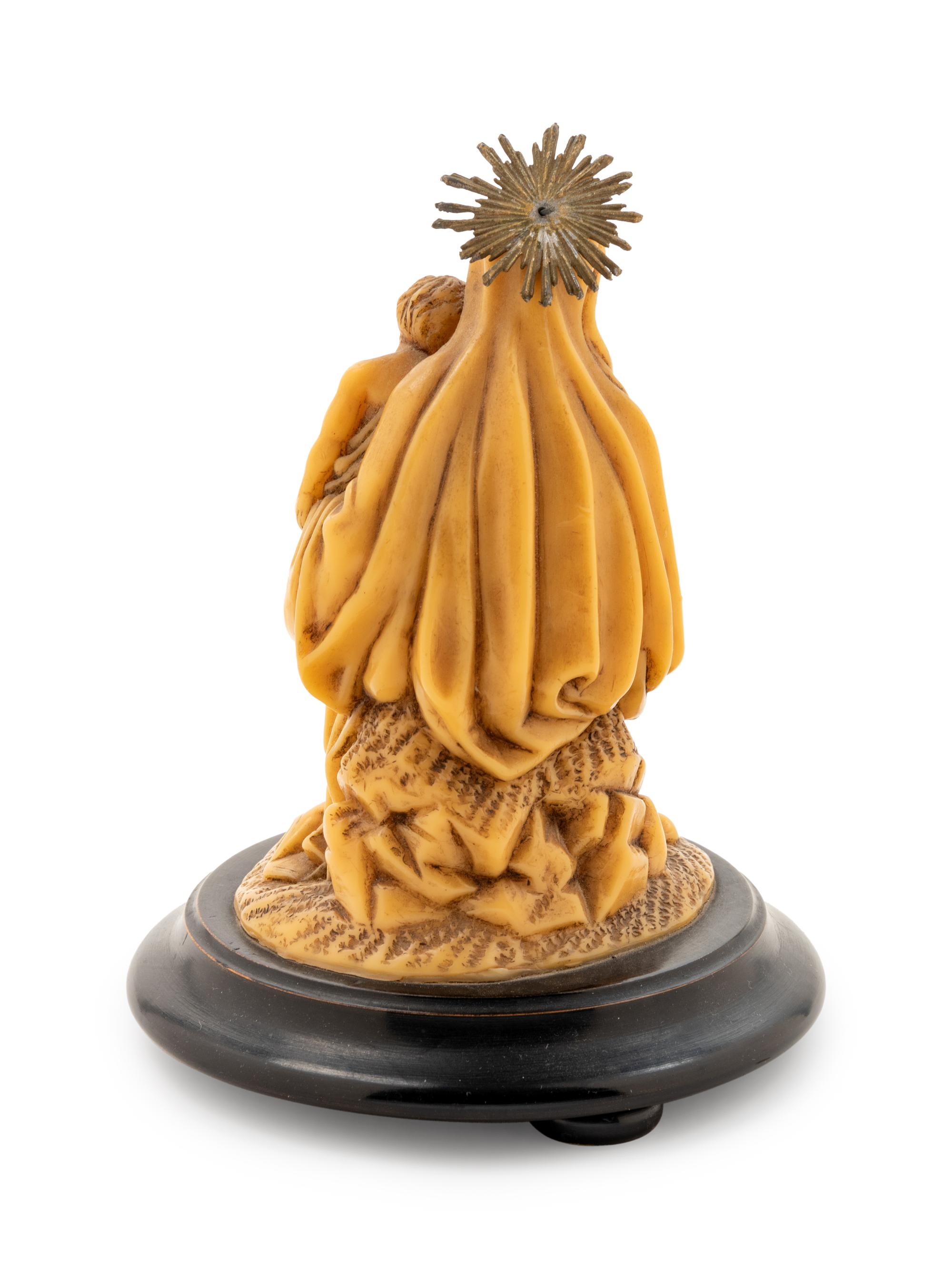 A Continental Carved Wax Sculpture