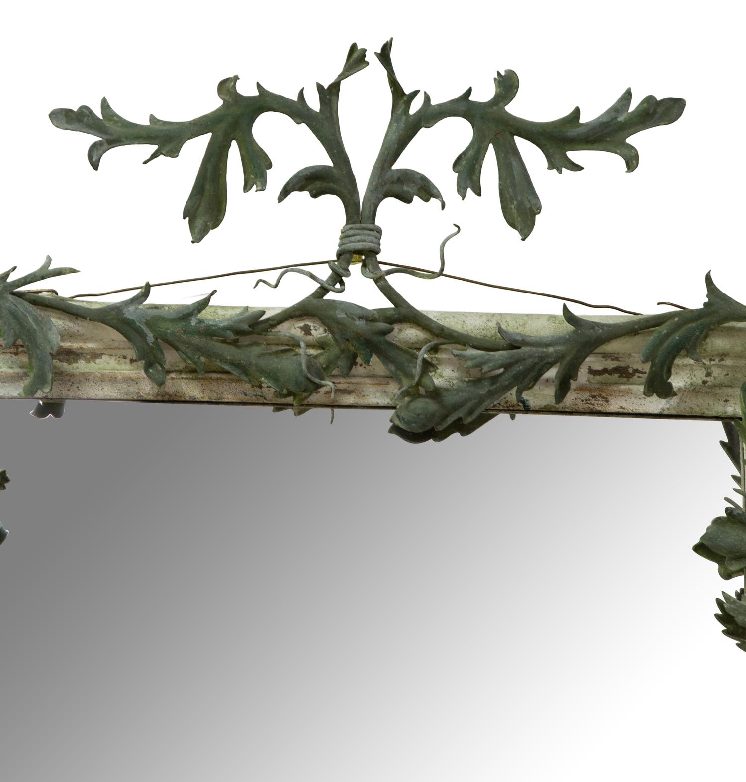 A Green Tole Peinte Foliate Mounted Mirror