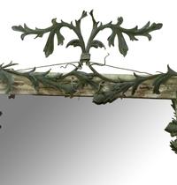 A Green Tole Peinte Foliate Mounted Mirror