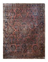 A Sarouk Wool Rug — 20TH CENTURY