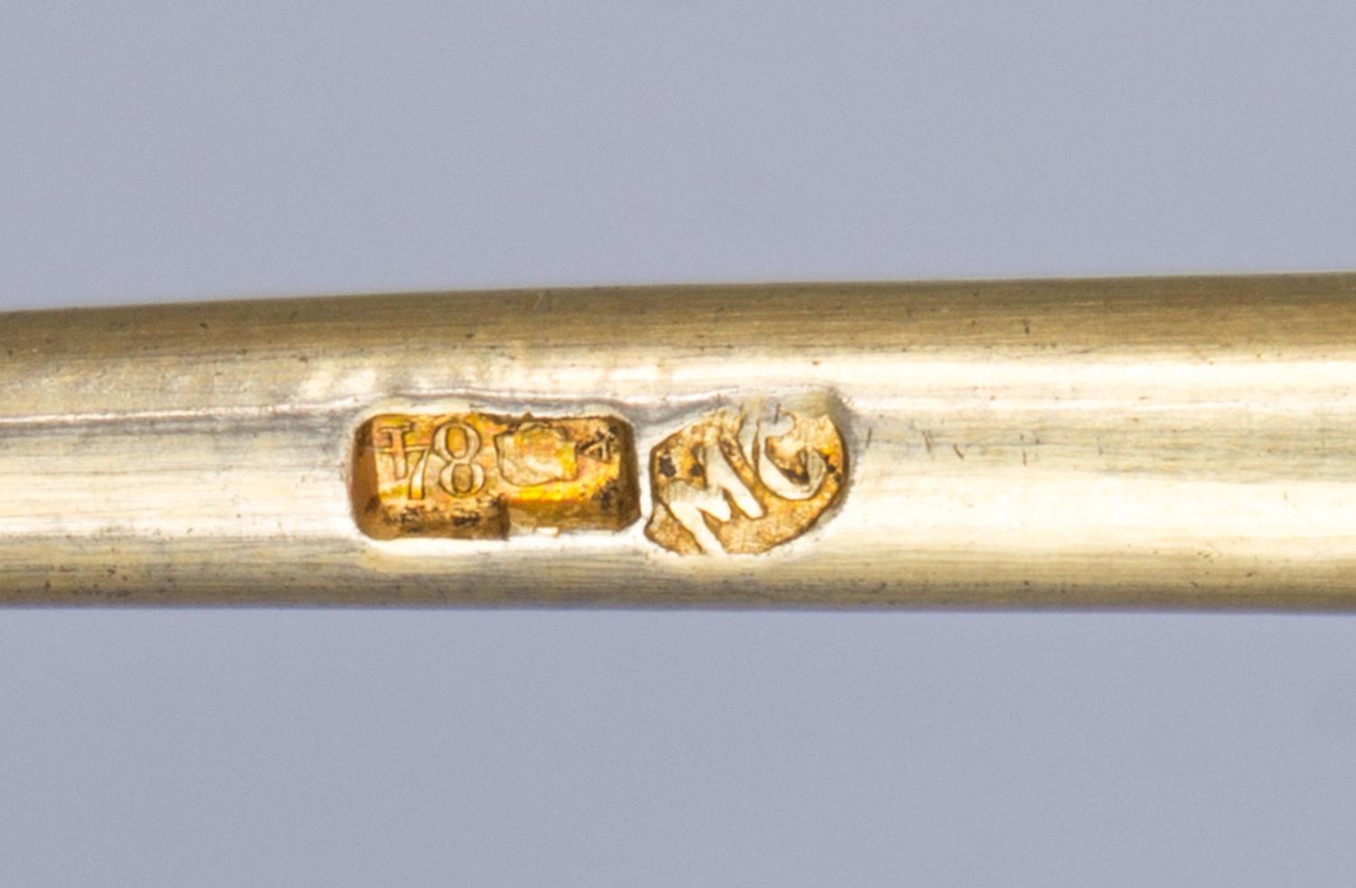 A Russian Silver-Gilt and Enamel Spoon, Mark of Maria Semenova, Moscow, late 19th century, the underside of the bowl with polychrome fl