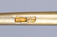 A Russian Silver-Gilt and Enamel Spoon, Mark of Maria Semenova, Moscow, late 19th century, the underside of the bowl with polychrome fl