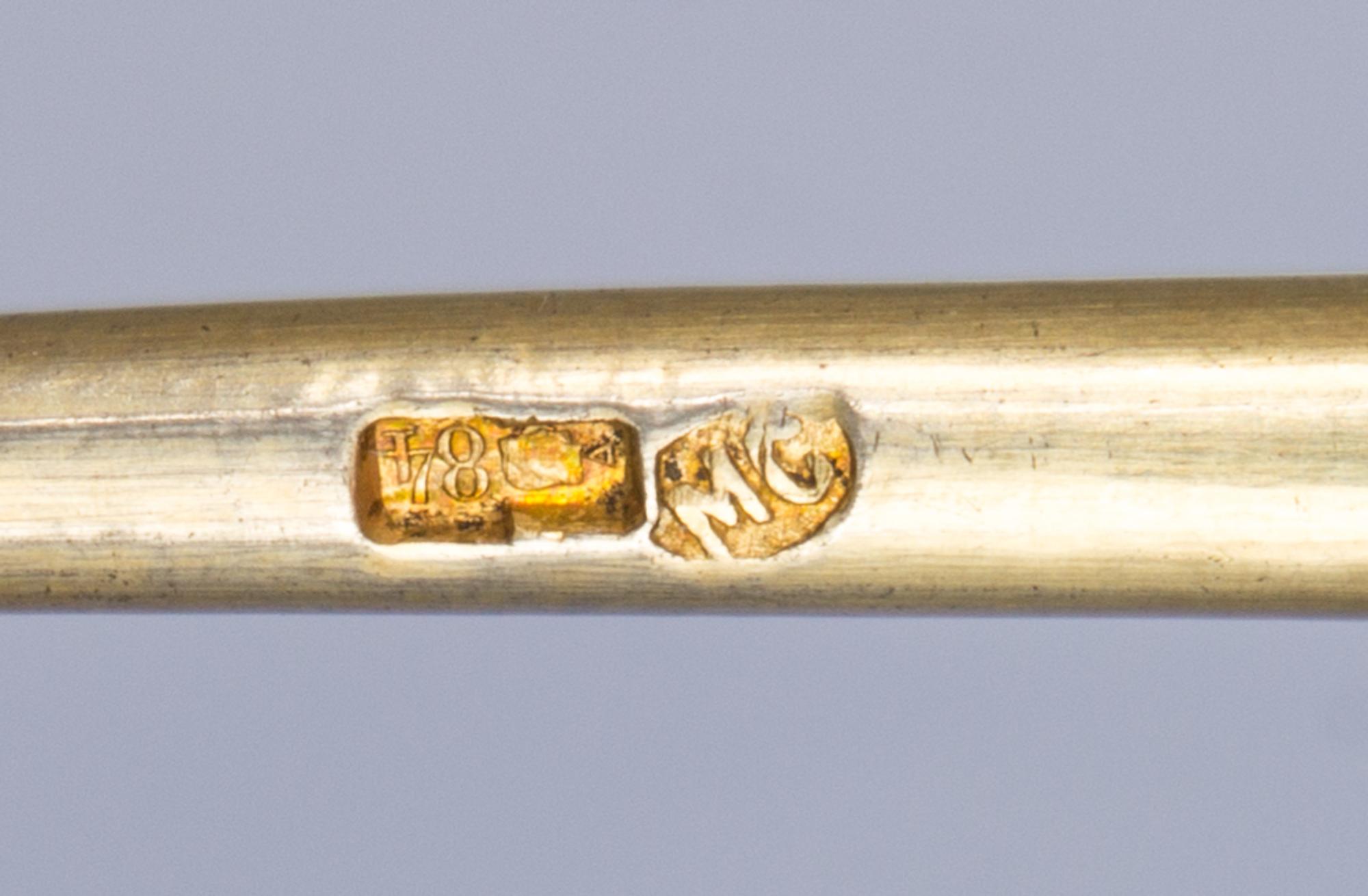 A Russian Silver-Gilt and Enamel Spoon, Mark of Maria Semenova, Moscow, late 19th century, the underside of the bowl with polychrome fl