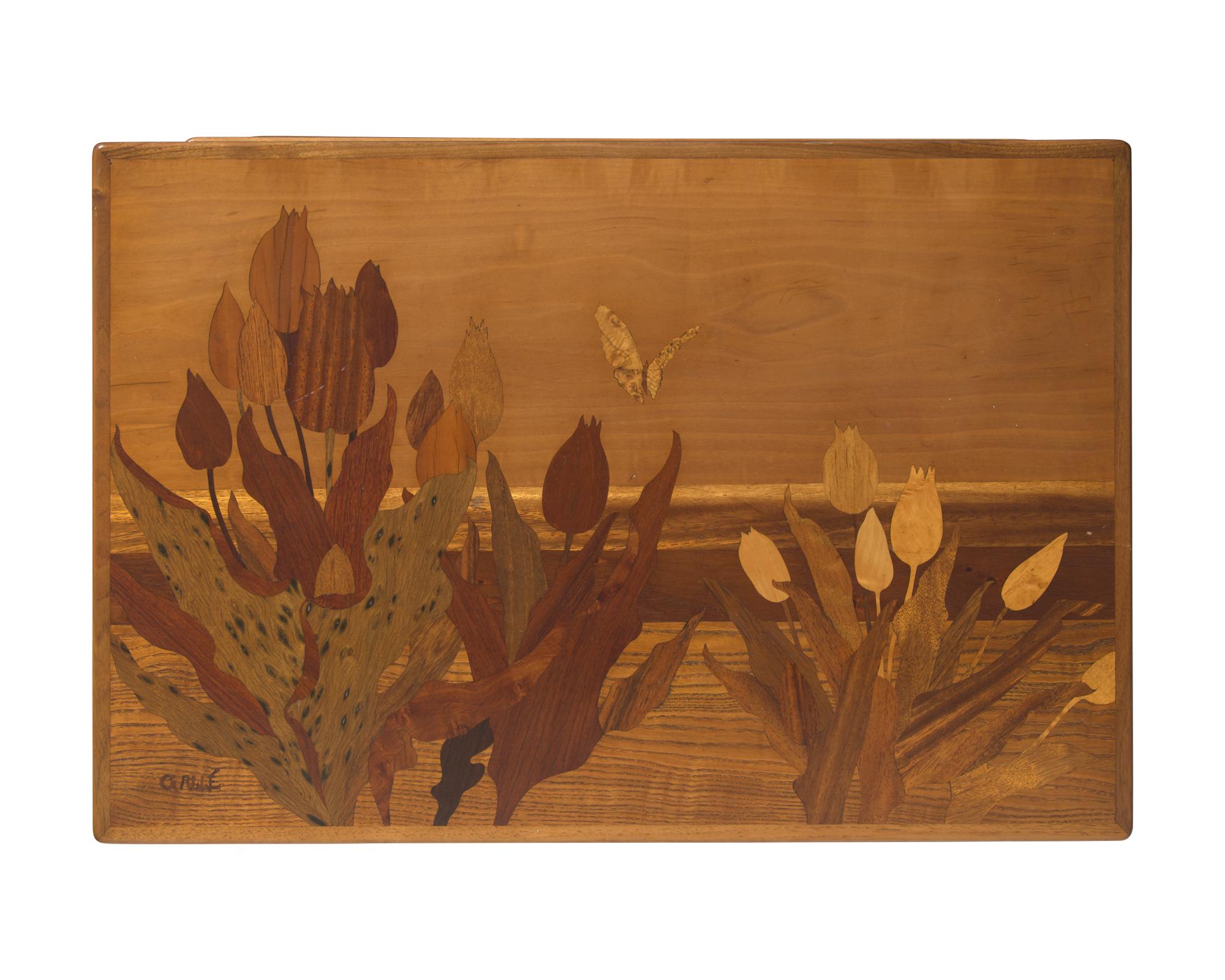 Émile Gallé (French, 1846-1904), A group of four Art Nouveau carved mahogany and marquetry nesting tables, circa 1900