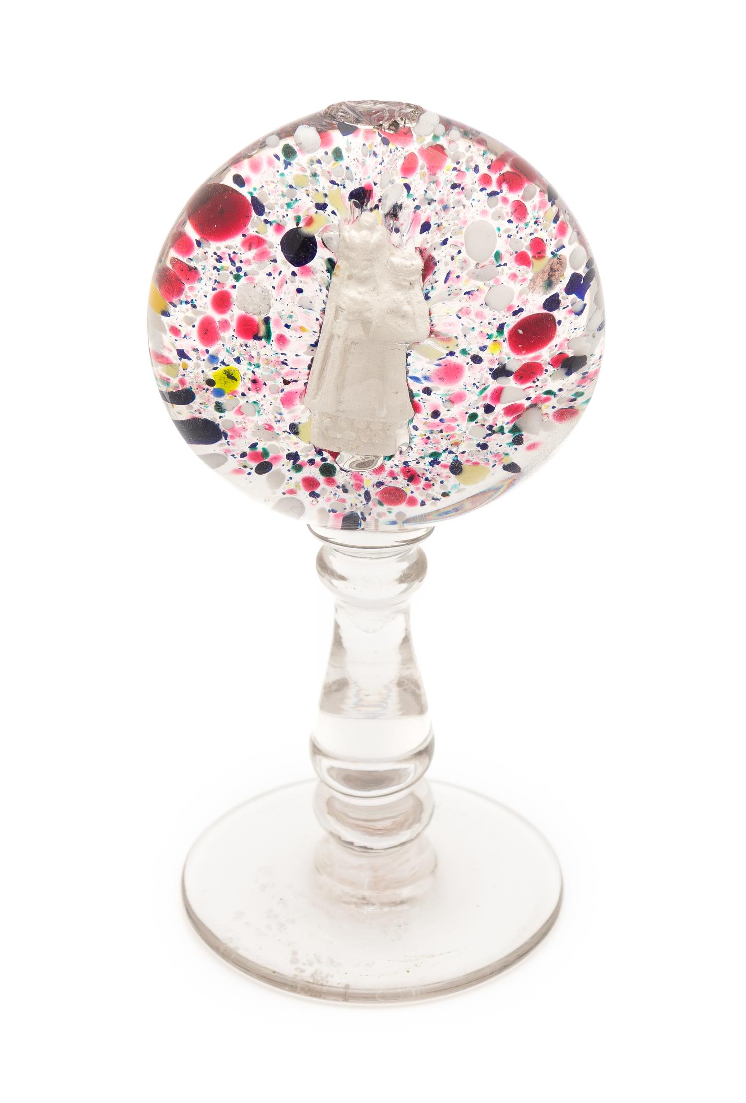 A Candy-Striped Heart and Priest Paperweight Height 7 1/8 inches.