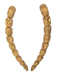 A Pair of Italian Giltwood Wall Appliques, Length 32 1/2 inches.