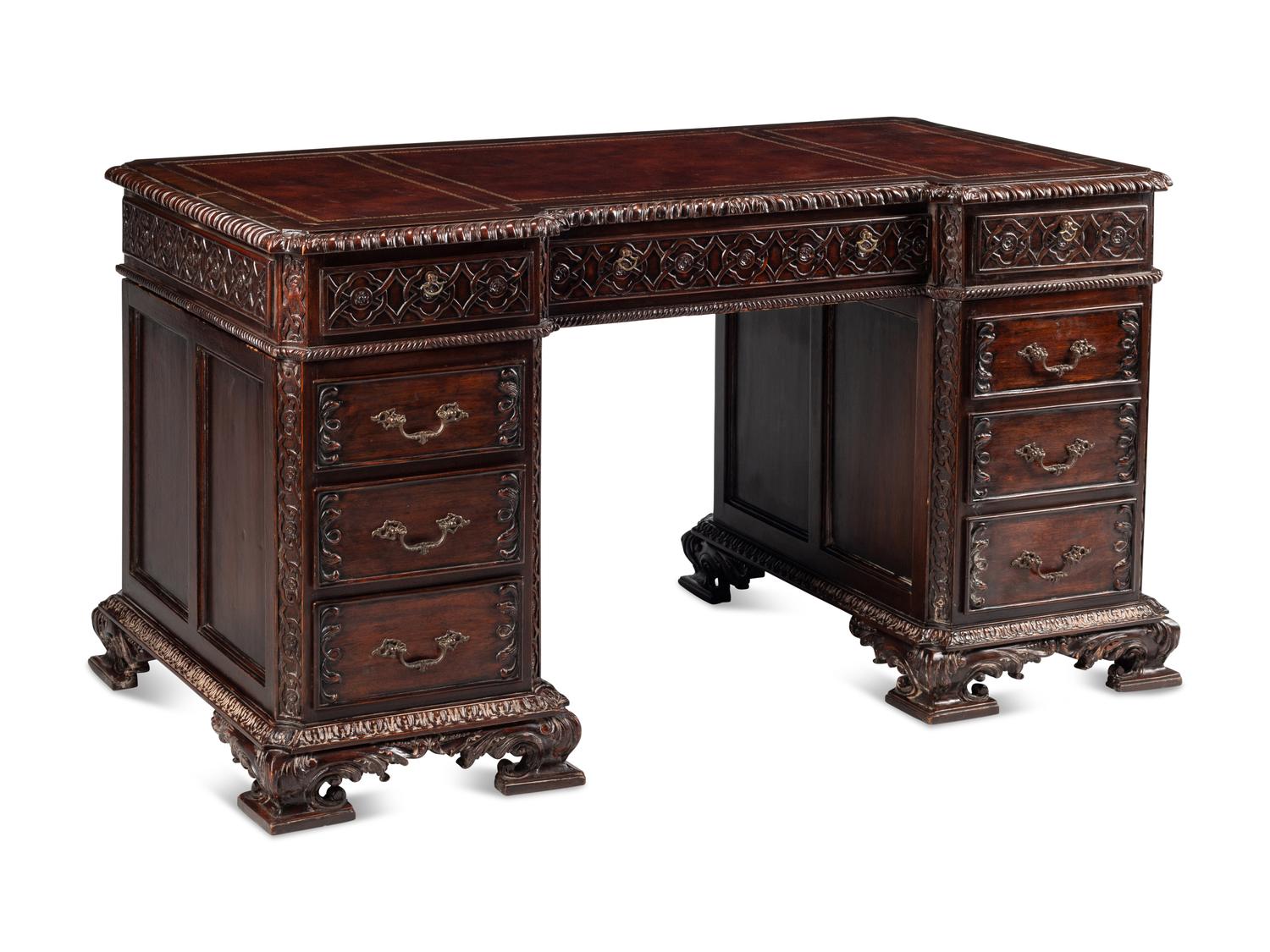 A George III Style Carved Mahogany Pedestal Desk