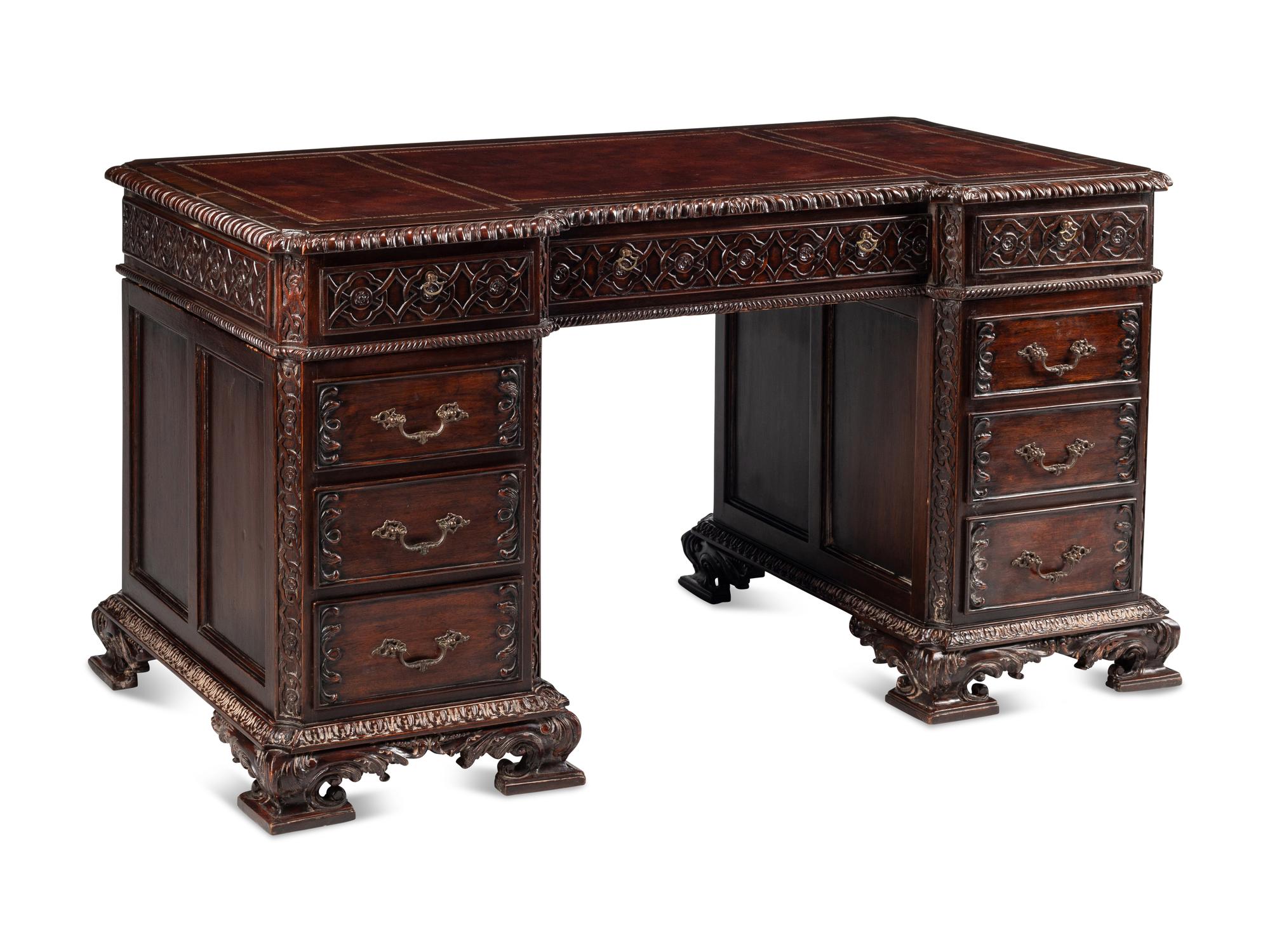 A George III Style Carved Mahogany Pedestal Desk
