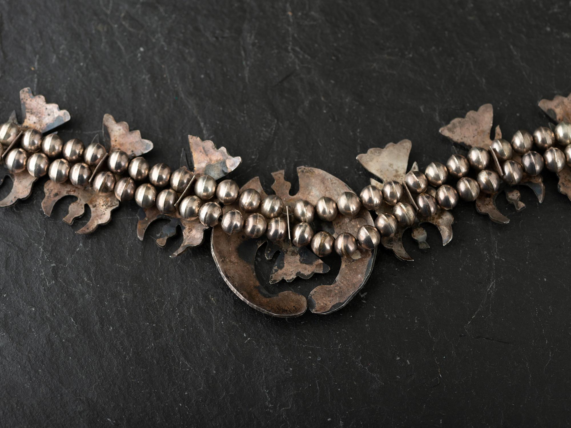Navajo Silver Waterbird Squash Blossom, with Coral and Turquoise Chip Inlay