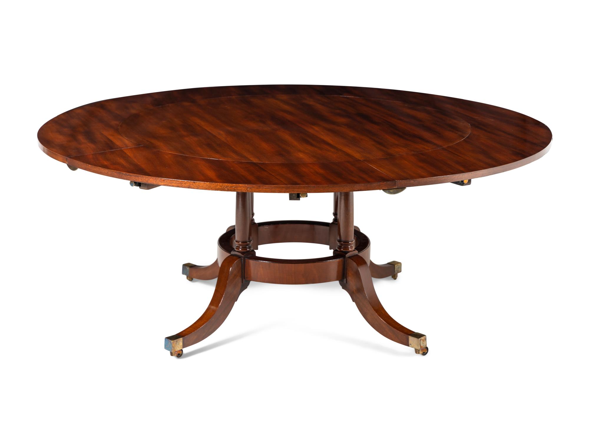 A George III Style Circular Extension Dining Table