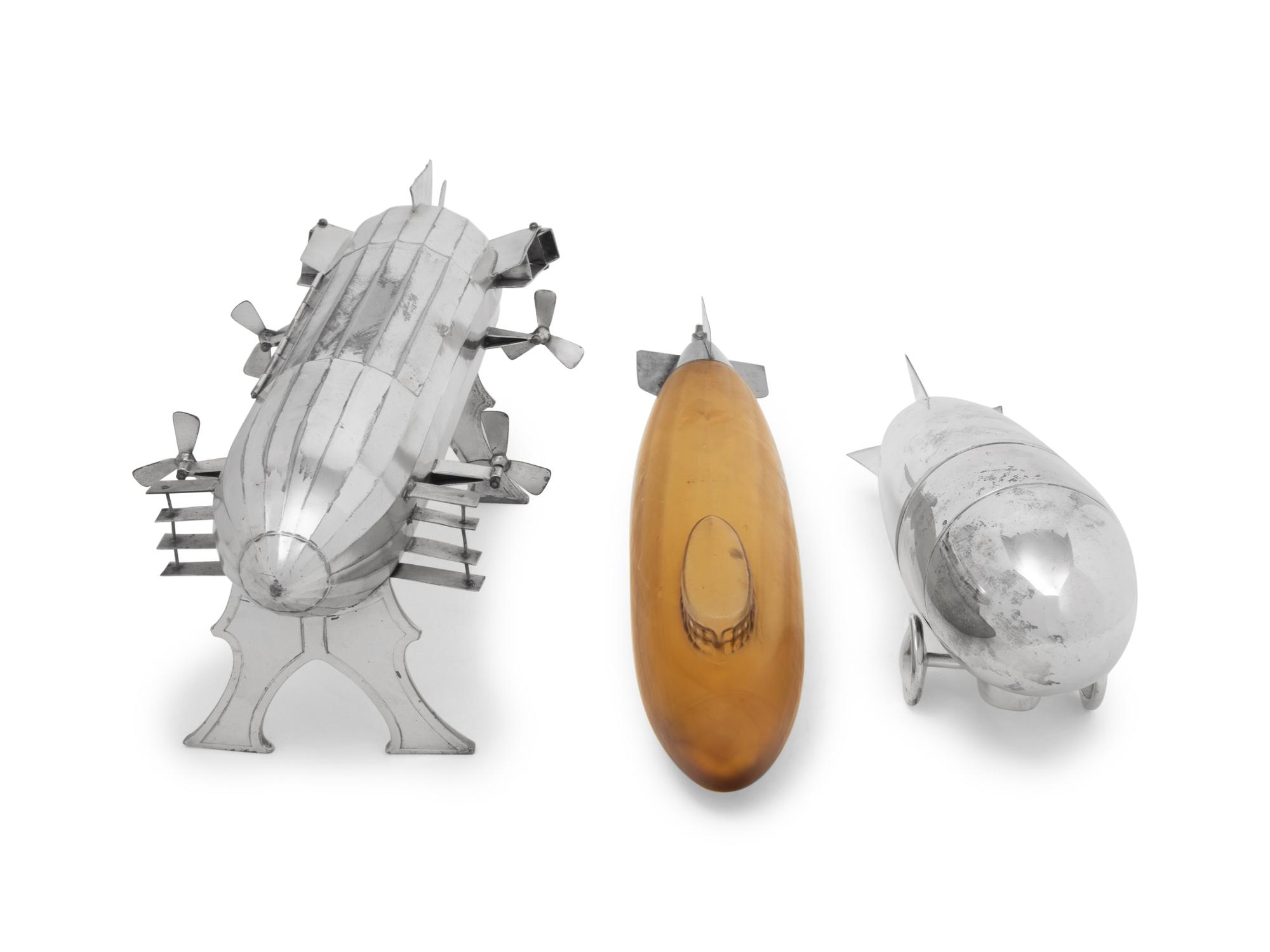 A Group of Three Blimp-Form Table Articles