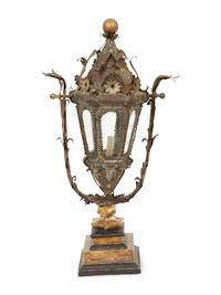An Italian Tole Swinging Lantern on a Giltwood Stand
