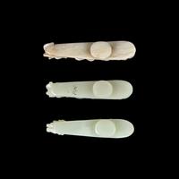 A Chinese 'Chicken-Bone' Jade and Two Pale Celadon Jade 'Dragon' Belt Hooks, Qing Dynasty 清 玉龍鉤三件