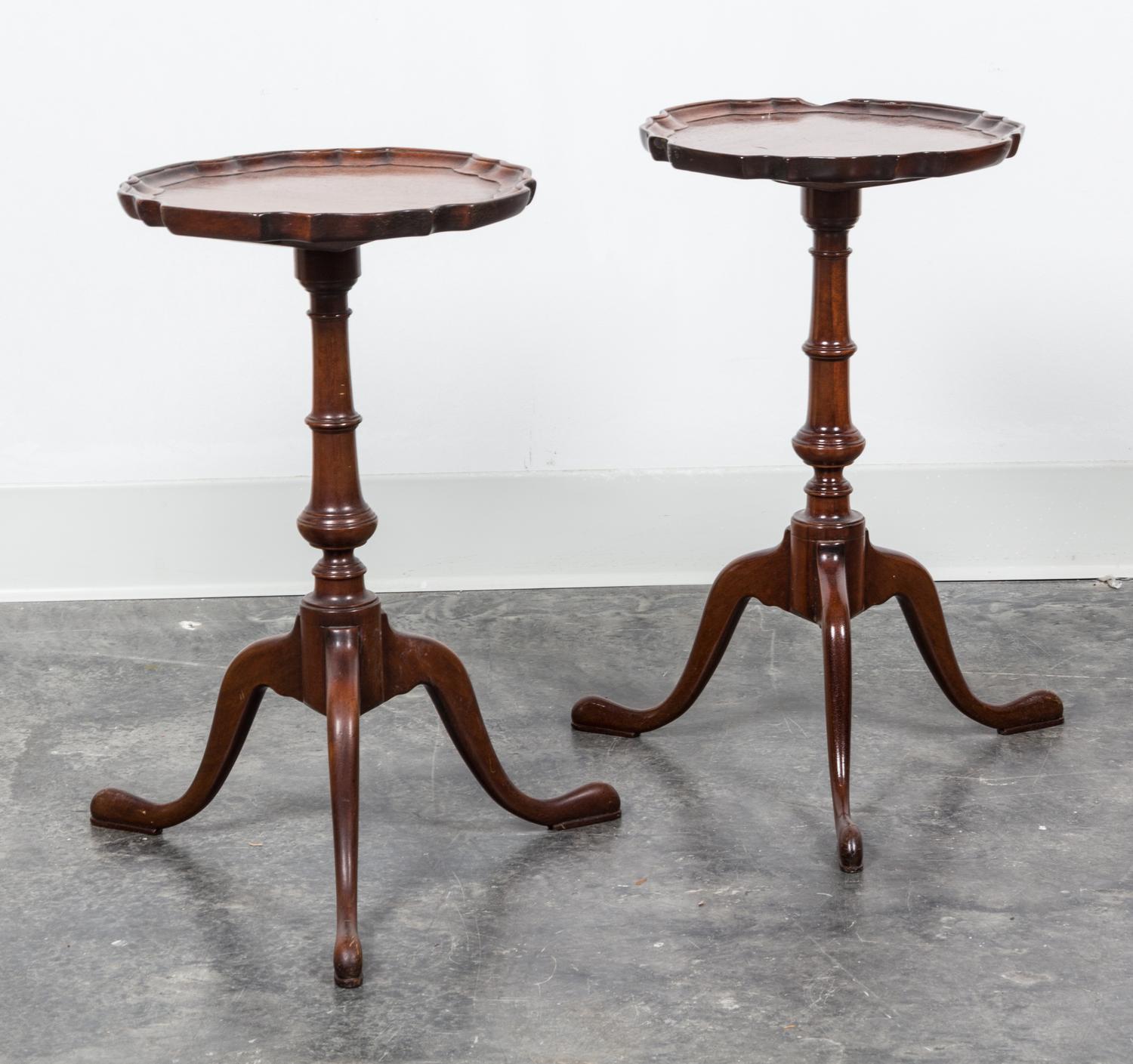 A Pair of Chippendale Style Mahogany Candle Stands Height 19 x diameter 11 inches. — 20TH CENTURY