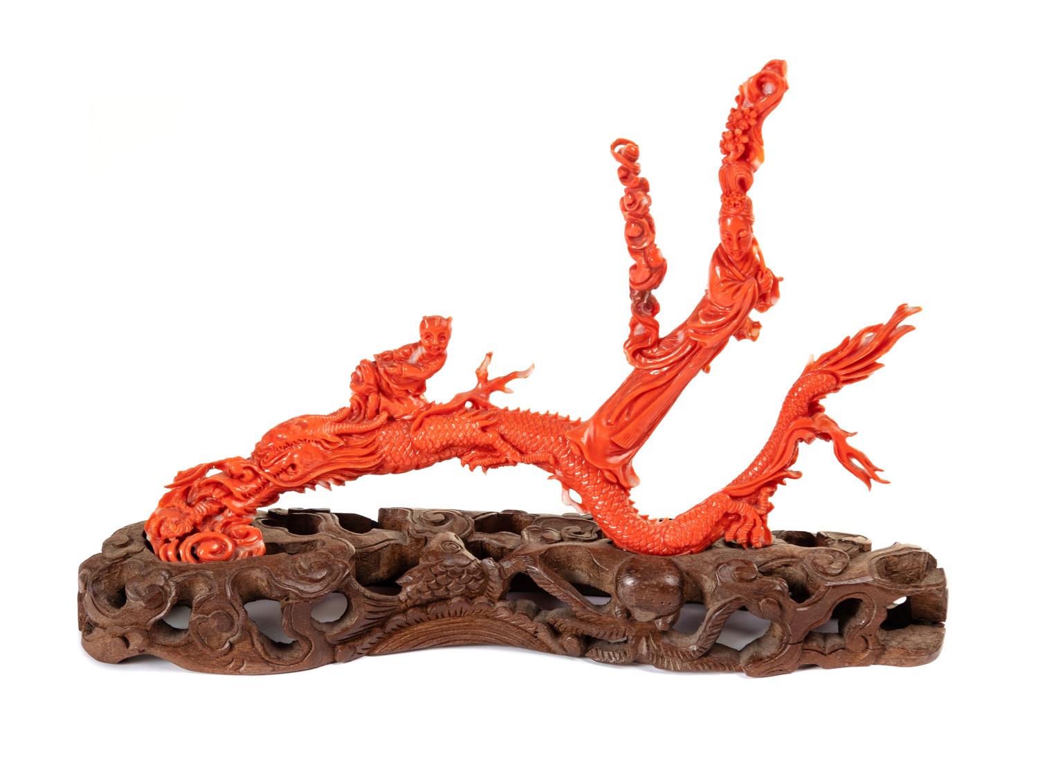 A Chinese Carved Coral Figural Group