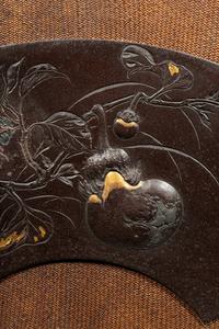A Japanese Mixed-Metal Fan-Shape Panel by Funakoshi Harumi (1868-1940)