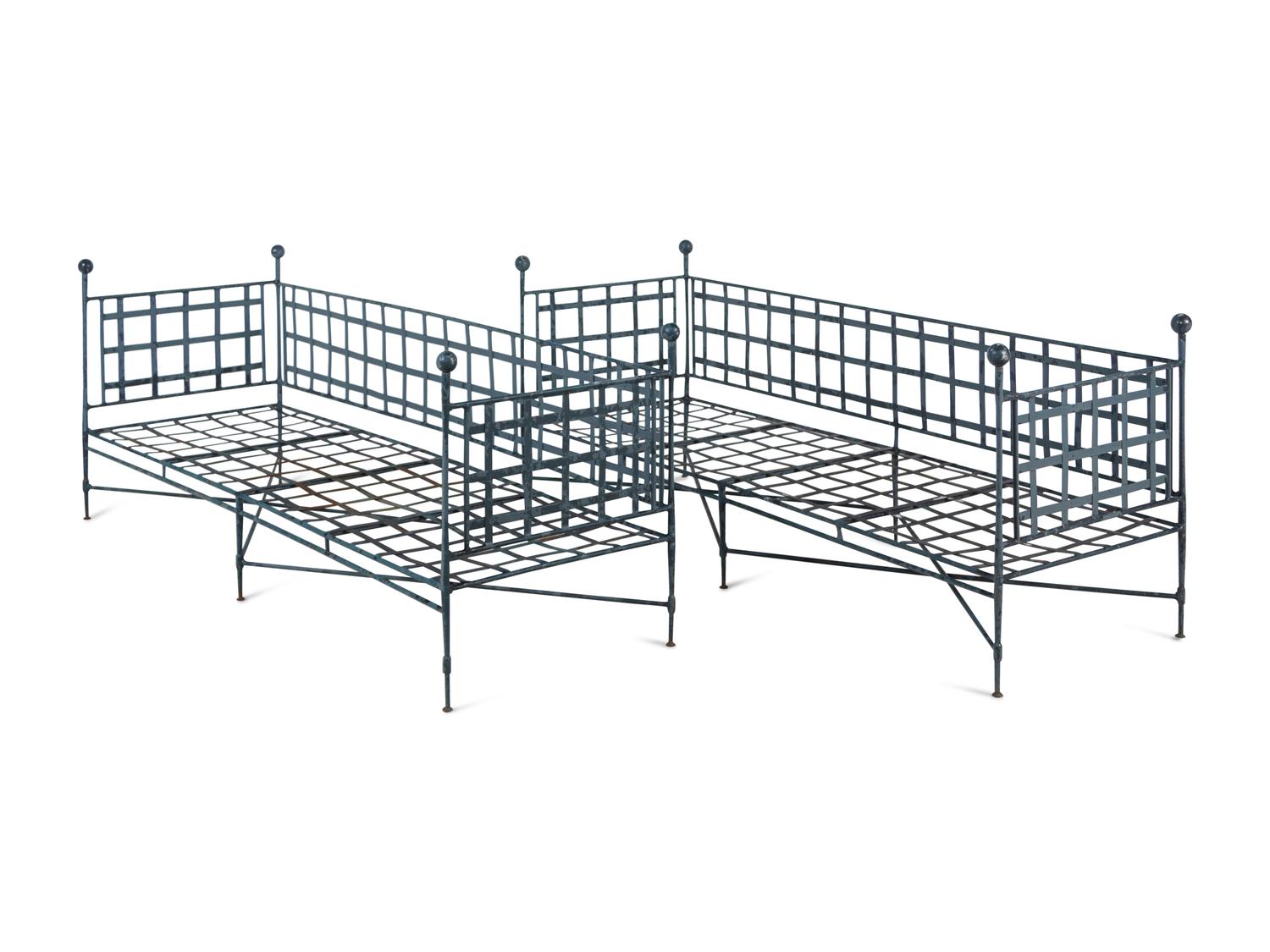 A Pair of Neoclassic Style Patinated Metal Garden Benches