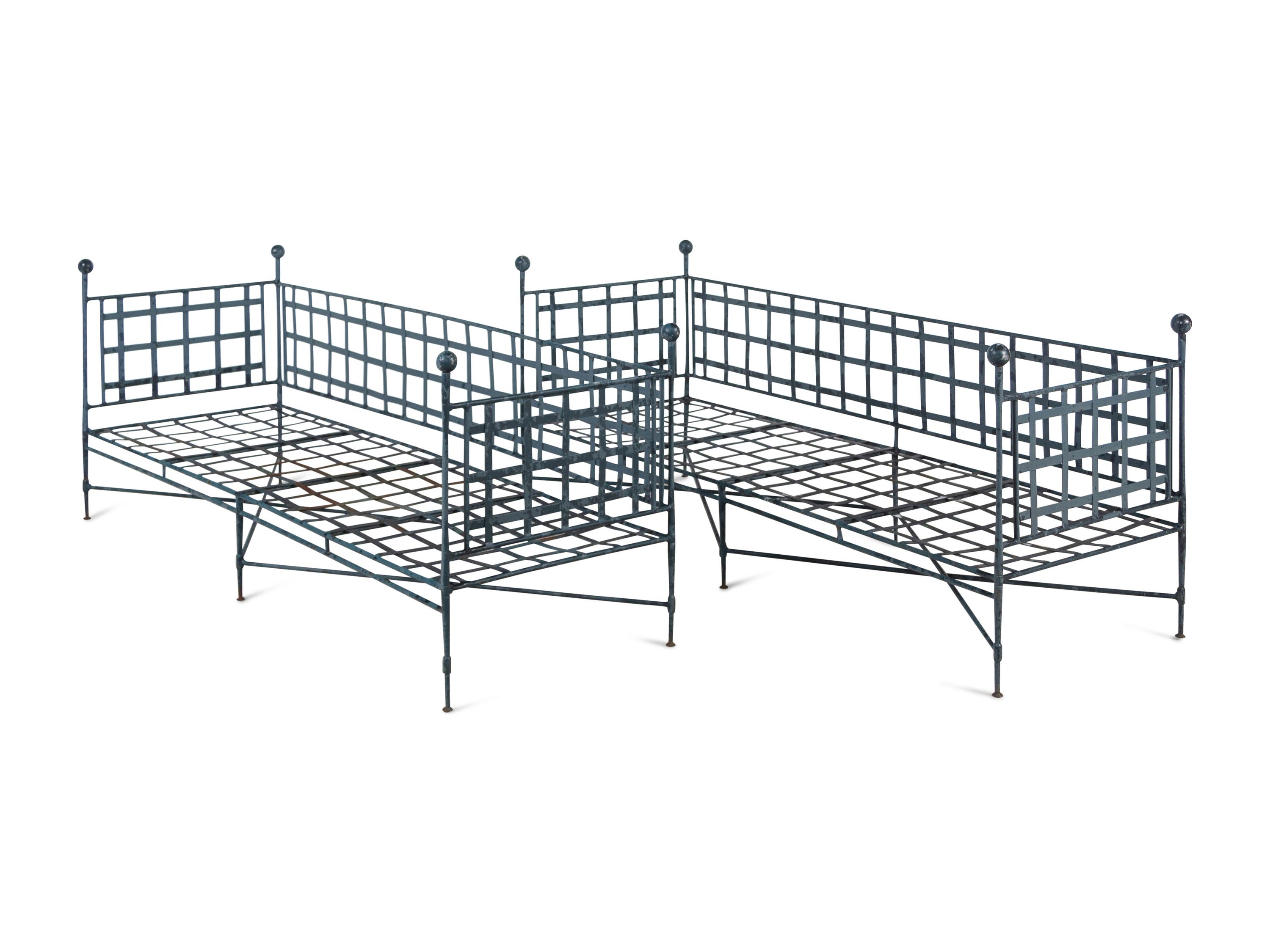A Pair of Neoclassic Style Patinated Metal Garden Benches