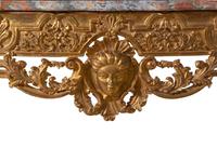 An Italian Carved Giltwood Marble-Top Console Table