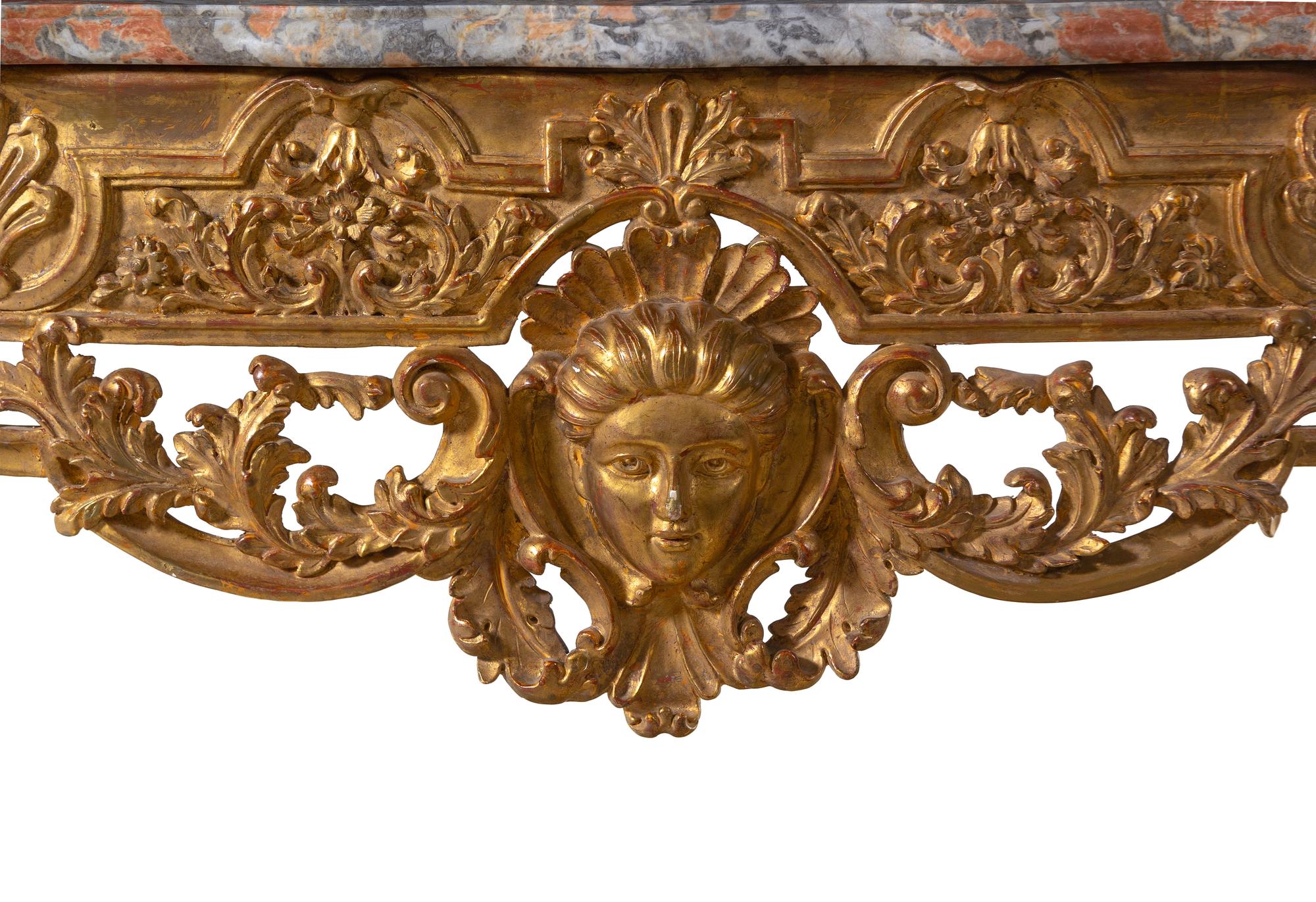 An Italian Carved Giltwood Marble-Top Console Table