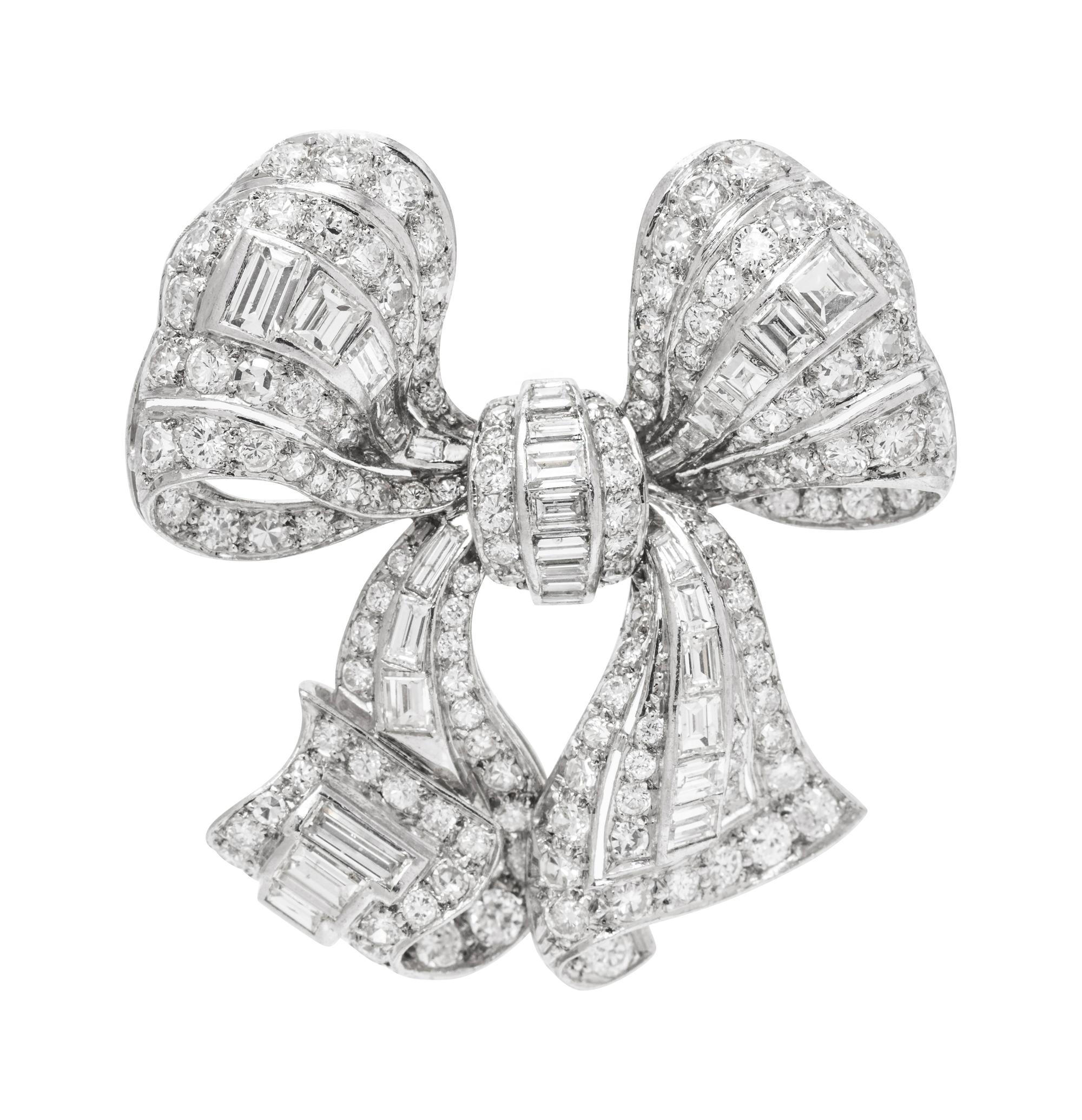 A Platinum and Diamond Bow Brooch,