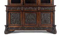 An Italian Rosewood and Carved Walnut Bookcase