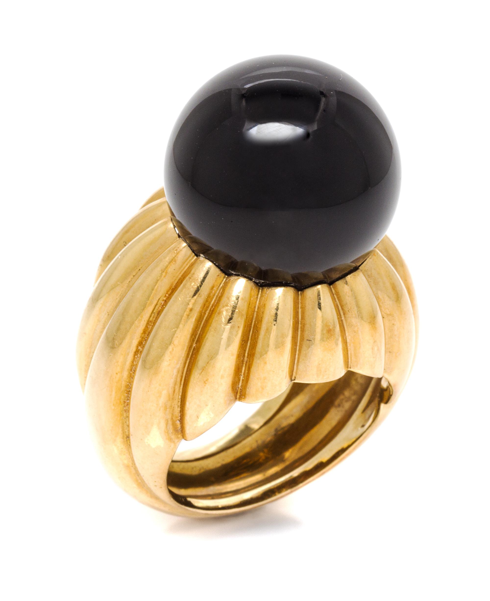 An 18 Karat Yellow Gold and Onyx Ring, C. Vollrath, 15.30 dwts.