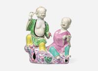 A Chinese famille rose-enameled "Hehe Erxian" figural group Qianlong/Jiaqing period 粉彩和合二仙瓷塑 清 乾隆或嘉慶