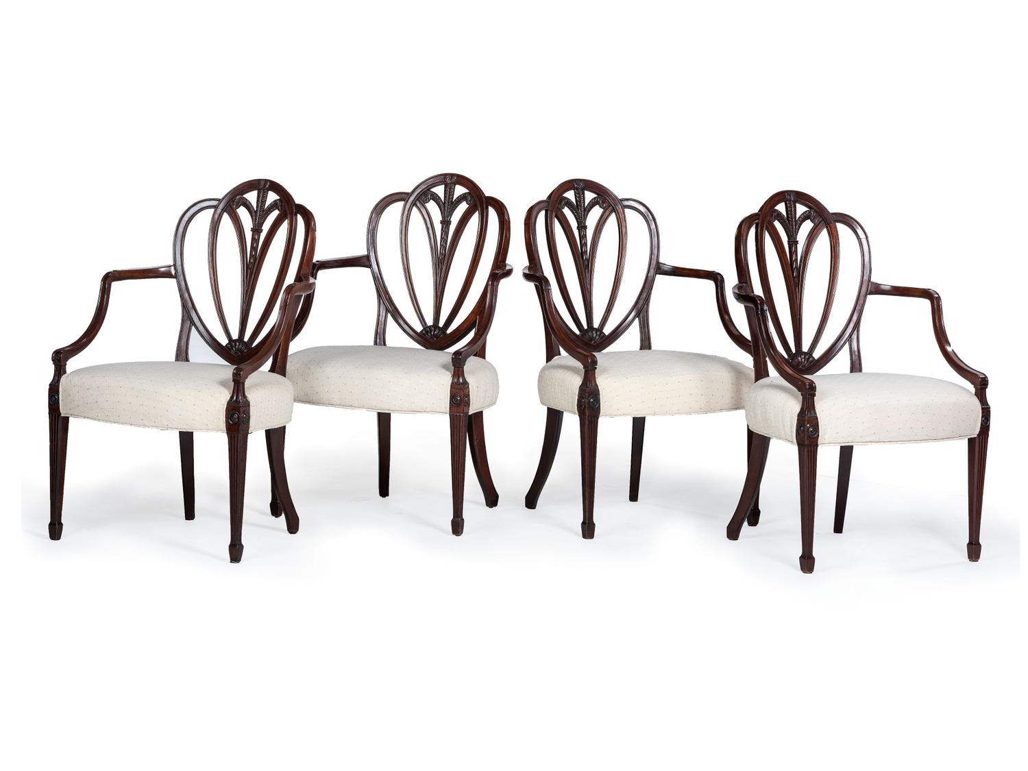 Four George III Mahogany Armchairs