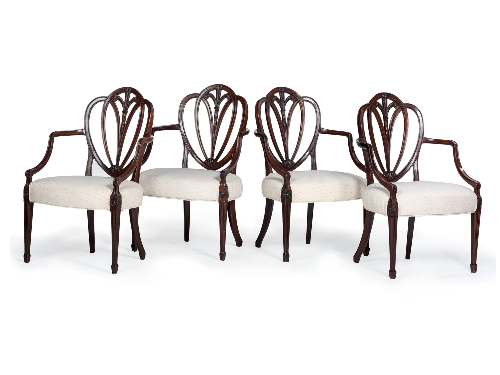 Four George III Mahogany Armchairs