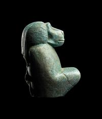 An Egyptian Faience Kneeling Baboon