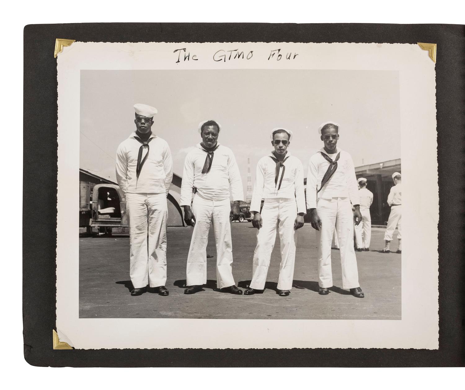 [KOREAN WAR]. Photograph album featuring African American sailors during the Korean War.