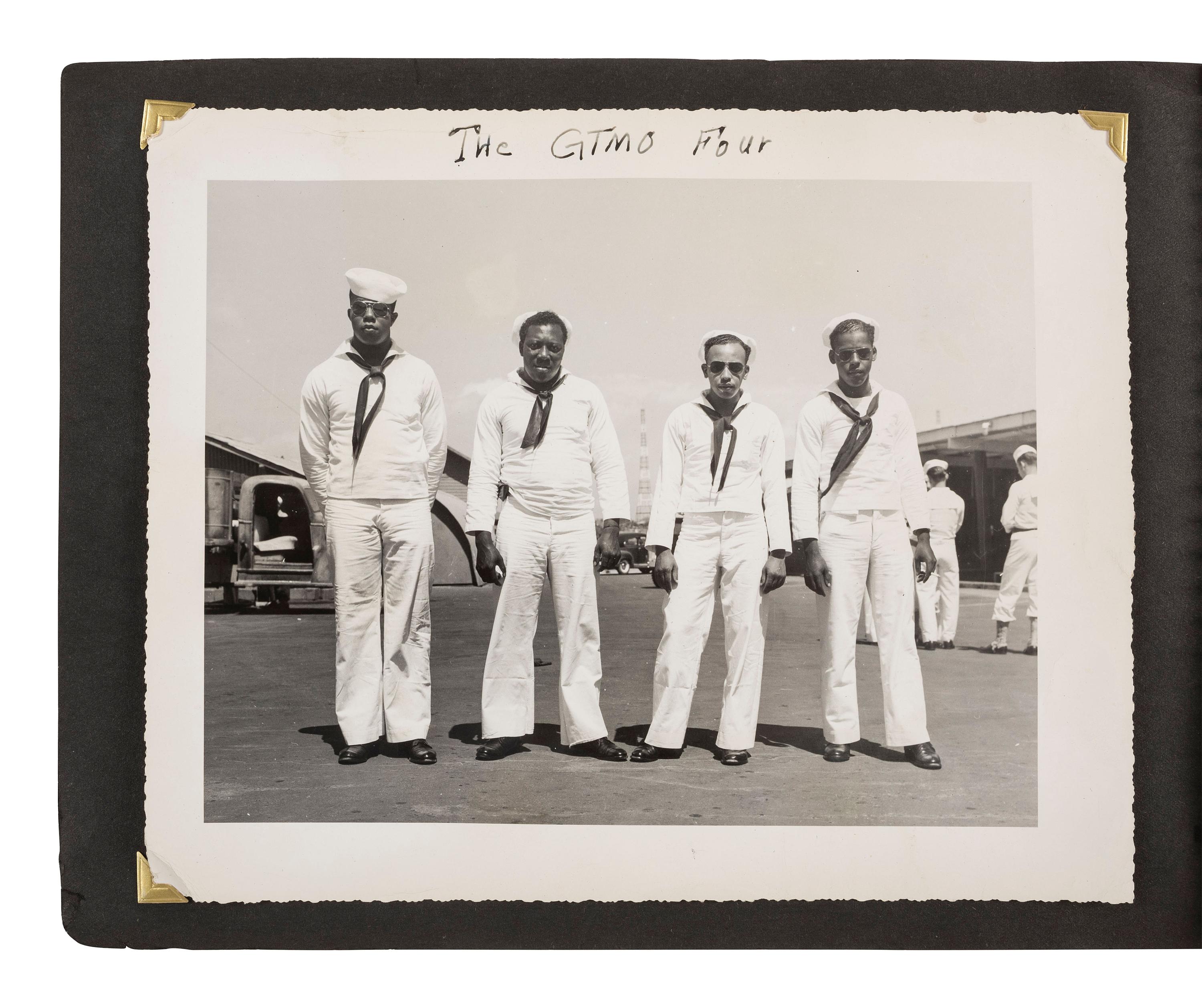[KOREAN WAR]. Photograph album featuring African American sailors during the Korean War.