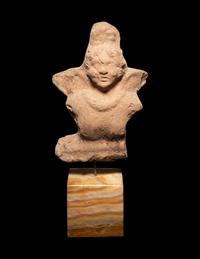 A Romano-Egyptian Terra Cotta Figure