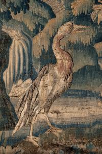 A Continental Wool Verdure Tapestry Fragment