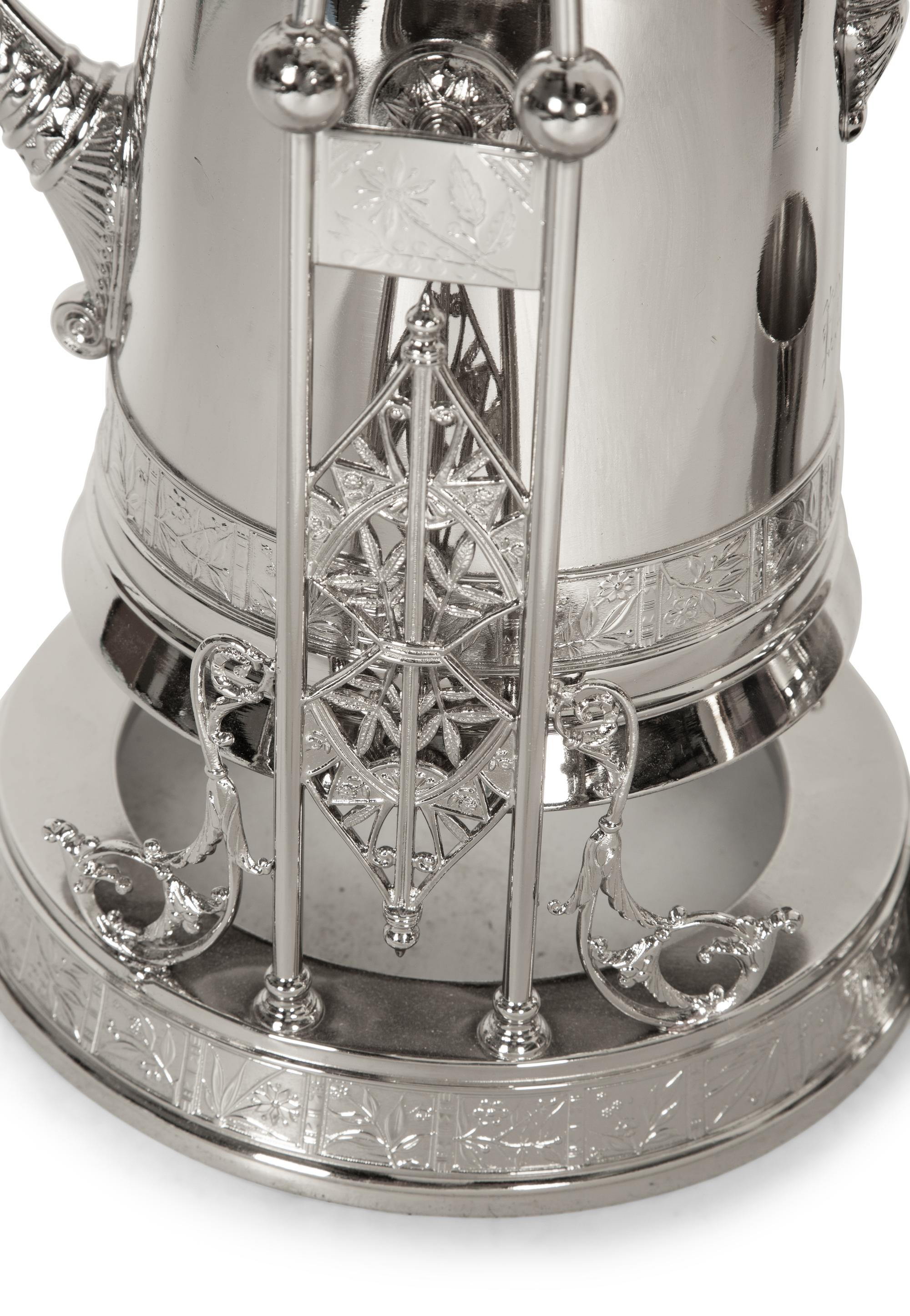 A Victorian Style Silver-Plated Tilting Pitcher and Goblet on Stand