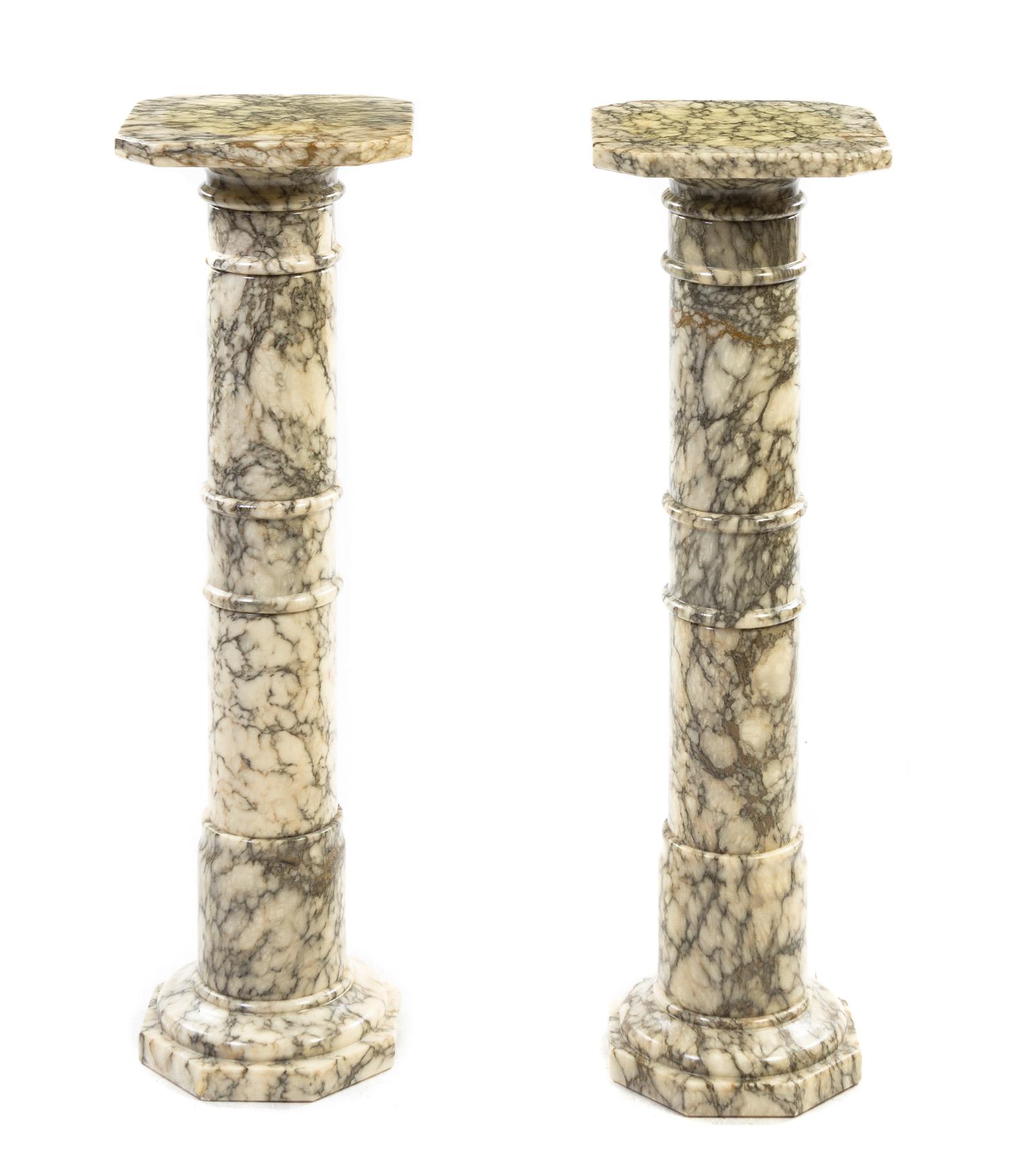 A Pair of Continental Marble Pedestals, Height 39 1/4 inches (each).